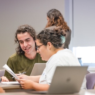 Students review a film script