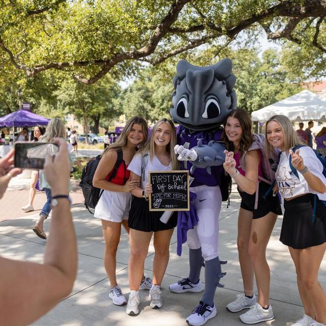 TCU students with SuperFrog at the annual TCU Welcome Home Event